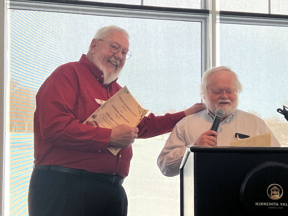 Howard Goltxz recieves an award at the Annual Awards Banquet